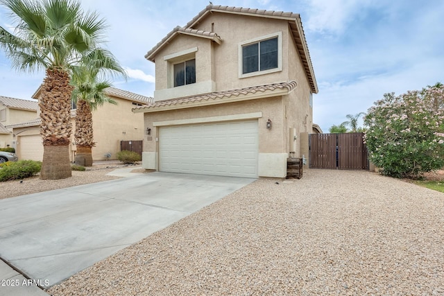 4041 W Hackamore Dr, Phoenix, AZ 85083 - view of front of property featuring a gate, stucco siding, a garage, a tile roof, and concrete driveway