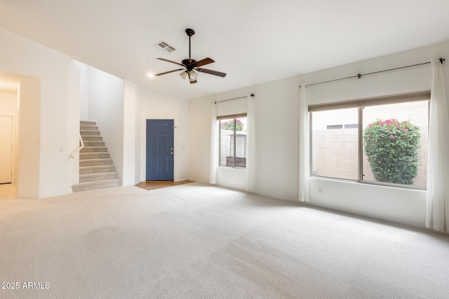 4041 W Hackamore Dr, Phoenix, AZ 85083 - carpeted spare room featuring a ceiling fan and stairway