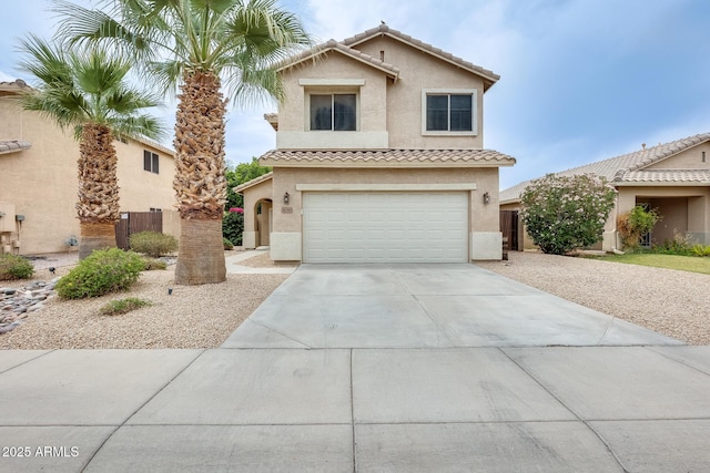 4041 W Hackamore Dr, Phoenix, AZ 85083 - mediterranean / spanish house featuring stucco siding, a tiled roof, an attached garage, and concrete driveway