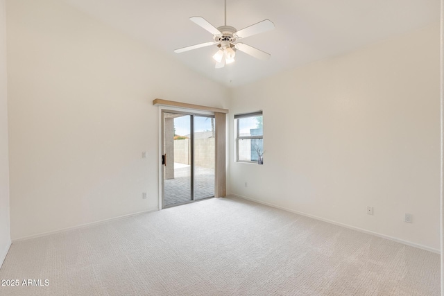 4041 W Hackamore Dr, Phoenix, AZ 85083 - spare room featuring light carpet, lofted ceiling, a ceiling fan, and baseboards
