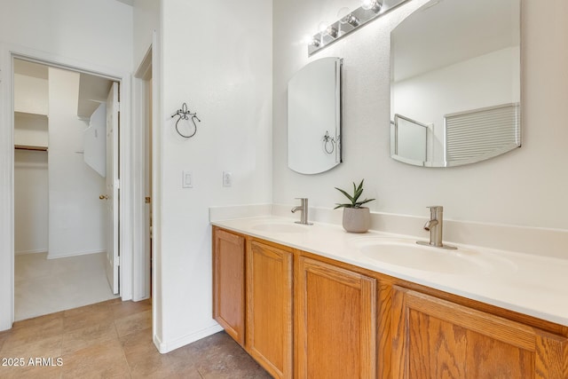4041 W Hackamore Dr, Phoenix, AZ 85083 - bathroom featuring double vanity, tile patterned flooring, and a spacious closet