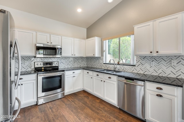 4041 W Hackamore Dr, Phoenix, AZ 85083 - kitchen with stainless steel appliances, a sink, white cabinets, backsplash, and recessed lighting