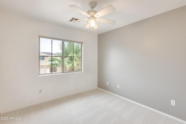 4041 W Hackamore Dr, Phoenix, AZ 85083 - empty room featuring light colored carpet, ceiling fan, and baseboards