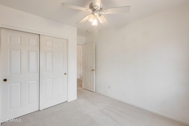 4041 W Hackamore Dr, Phoenix, AZ 85083 - unfurnished bedroom featuring light carpet, a closet, baseboards, and ceiling fan