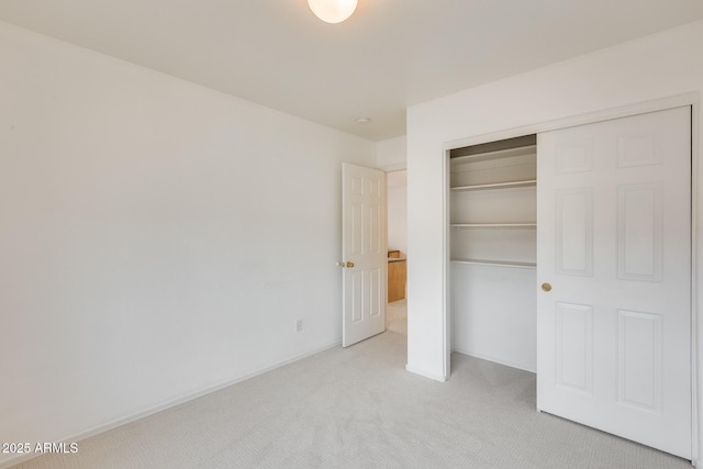 4041 W Hackamore Dr, Phoenix, AZ 85083 - unfurnished bedroom featuring light carpet, a closet, and baseboards