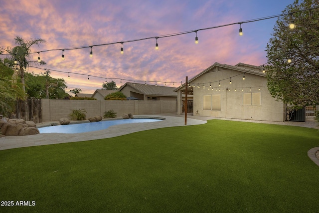 4041 W Hackamore Dr, Phoenix, AZ 85083 - yard at dusk featuring a patio area