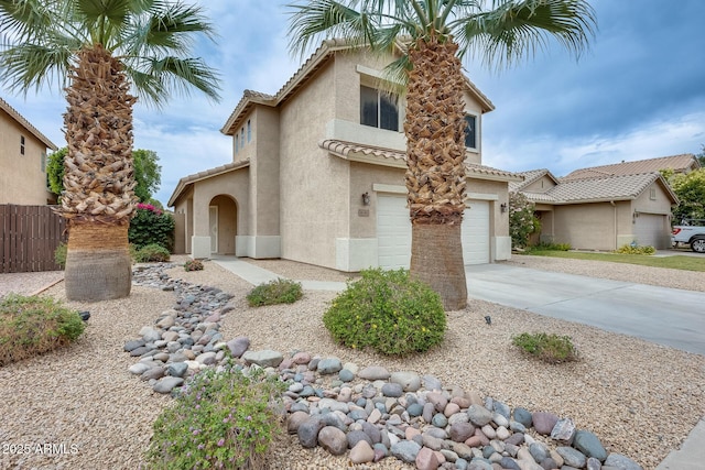 4041 W Hackamore Dr, Phoenix, AZ 85083 - view of front of property with stucco siding, concrete driveway, an attached garage, and a tiled roof