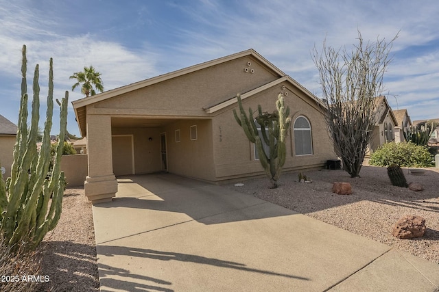 view of front of property with a carport