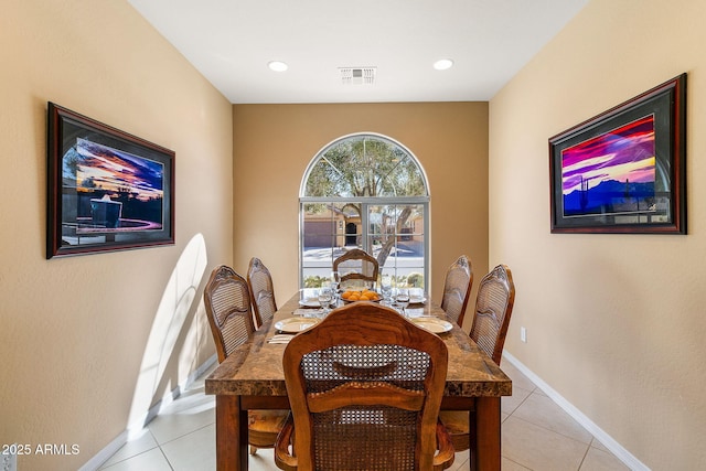 dining area with light tile patterned floors