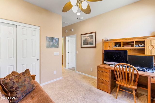 home office featuring ceiling fan and light colored carpet