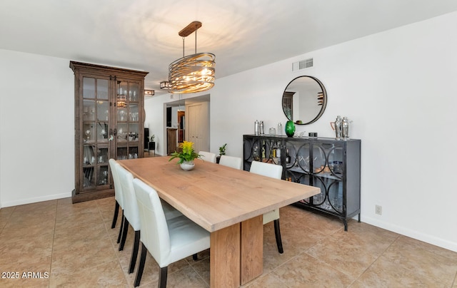 12682 N 80th Pl, Scottsdale, AZ 85260 - dining space with a chandelier and light tile patterned floors