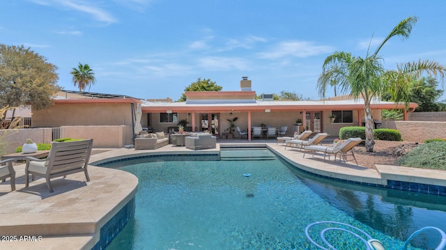 12682 N 80th Pl, Scottsdale, AZ 85260 - swimming pool featuring outdoor lounge area, a patio, and french doors