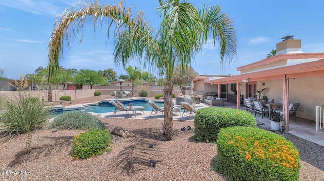 12682 N 80th Pl, Scottsdale, AZ 85260 - view of swimming pool with outdoor lounge area, a fenced backyard, and a patio