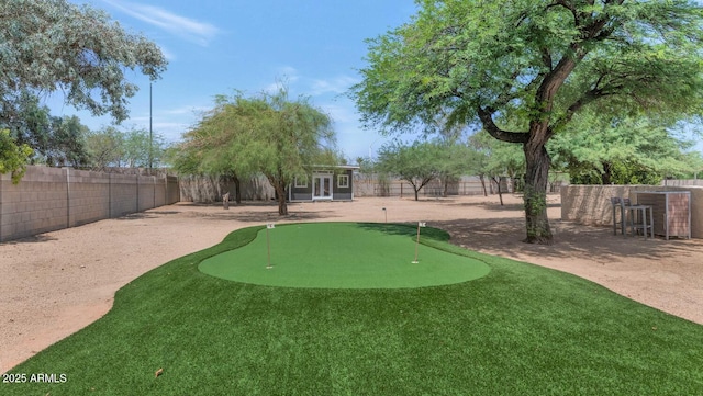 12682 N 80th Pl, Scottsdale, AZ 85260 - view of community with a putting green and a fenced backyard
