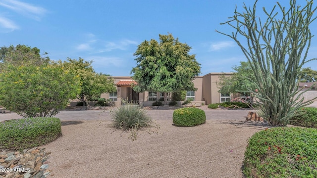 12682 N 80th Pl, Scottsdale, AZ 85260 - view of front facade with stucco siding and a tile roof
