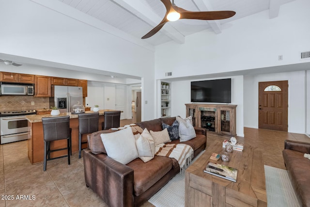 12682 N 80th Pl, Scottsdale, AZ 85260 - living area featuring ceiling fan, high vaulted ceiling, and beamed ceiling