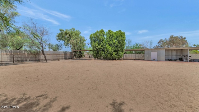 12682 N 80th Pl, Scottsdale, AZ 85260 - fenced backyard with an outbuilding and a carport
