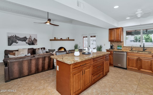12682 N 80th Pl, Scottsdale, AZ 85260 - kitchen featuring stainless steel dishwasher, a ceiling fan, brown cabinetry, light tile patterned floors, and recessed lighting