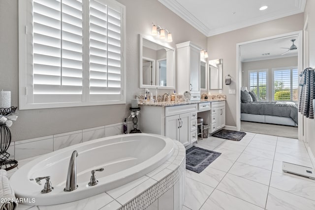 bathroom featuring tiled bath, ceiling fan, vanity, and ornamental molding