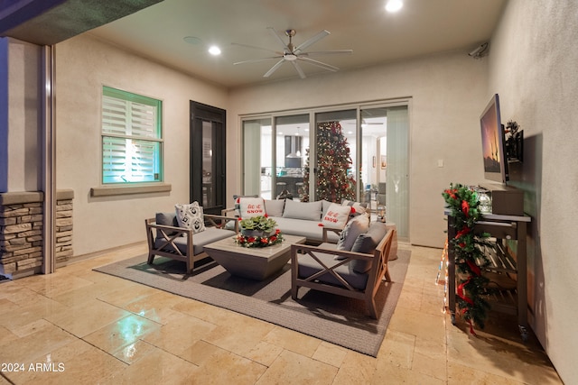 living room featuring ceiling fan