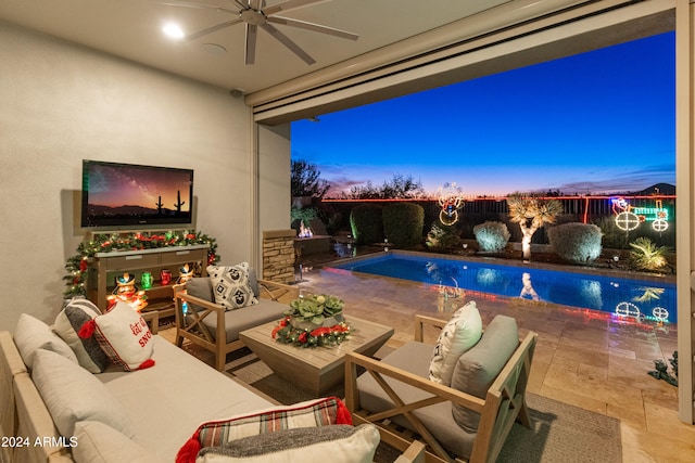 view of swimming pool with ceiling fan