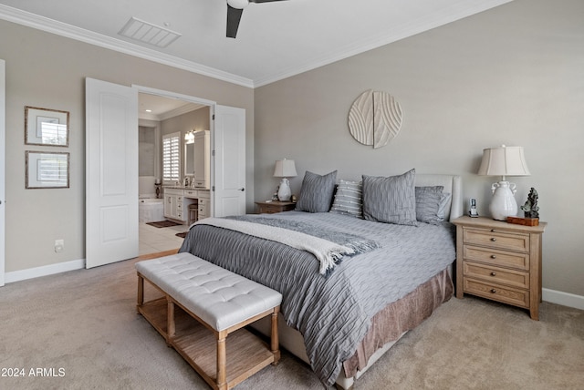 bedroom with light carpet, ensuite bath, ceiling fan, and crown molding