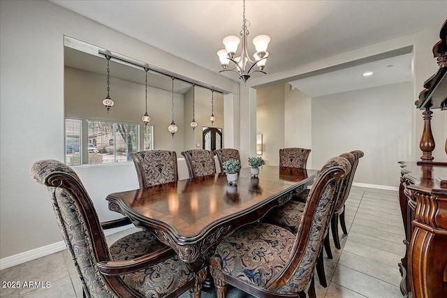 18207 W Sells Dr, Goodyear, AZ 85395 - dining space featuring a chandelier and tile patterned flooring