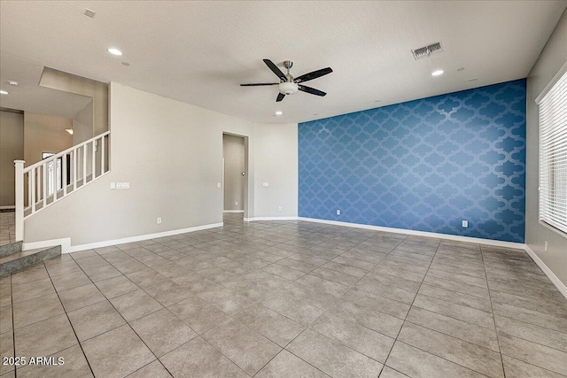 18207 W Sells Dr, Goodyear, AZ 85395 - unfurnished living room with a ceiling fan, wallpapered walls, stairway, recessed lighting, and tile patterned flooring