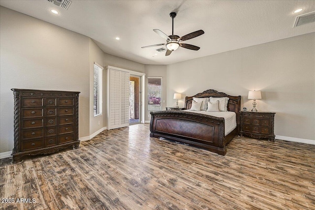 18207 W Sells Dr, Goodyear, AZ 85395 - bedroom featuring wood finished floors, access to outside, ceiling fan, and recessed lighting