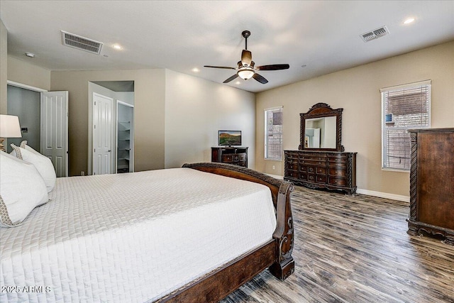 18207 W Sells Dr, Goodyear, AZ 85395 - bedroom with wood finished floors, a ceiling fan, and recessed lighting