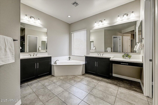 18207 W Sells Dr, Goodyear, AZ 85395 - full bath with a bath, two vanities, and tile patterned flooring