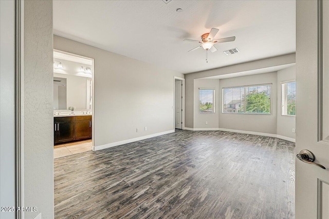 18207 W Sells Dr, Goodyear, AZ 85395 - unfurnished room featuring wood finished floors and ceiling fan