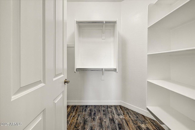 18207 W Sells Dr, Goodyear, AZ 85395 - spacious closet with dark wood finished floors