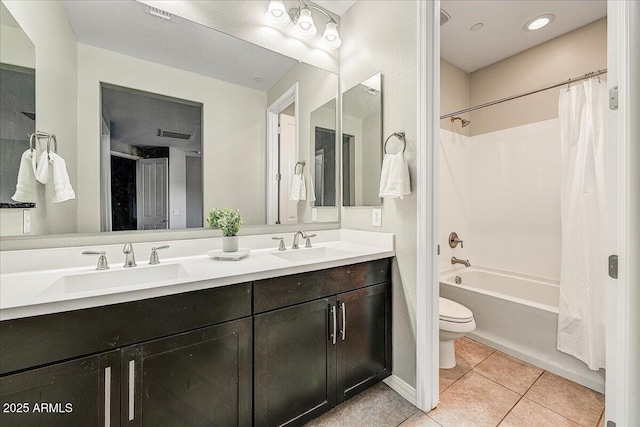 18207 W Sells Dr, Goodyear, AZ 85395 - bathroom with double vanity, tile patterned flooring, and shower / tub combo with curtain