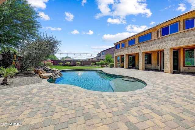 18207 W Sells Dr, Goodyear, AZ 85395 - view of swimming pool with a patio area and a fenced backyard