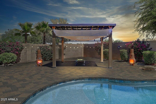 18207 W Sells Dr, Goodyear, AZ 85395 - view of swimming pool featuring a fenced backyard and a patio area