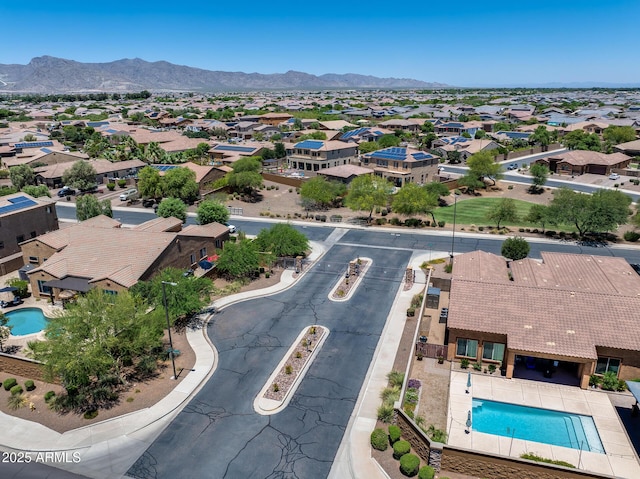 18207 W Sells Dr, Goodyear, AZ 85395 - aerial view of residential area featuring a pool area and mountains