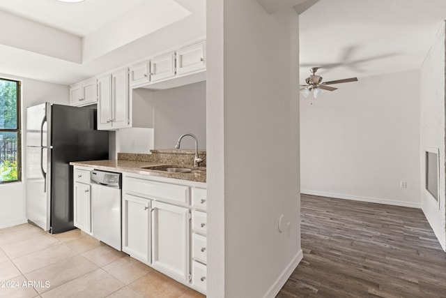 kitchen with white cabinets, ceiling fan, stainless steel appliances, and sink