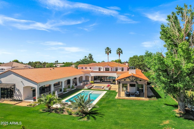 2339 E Virgo Pl, Chandler, AZ 85249 - rear view of house featuring a gazebo, a lawn, an outdoor pool, a tiled roof, and stucco siding