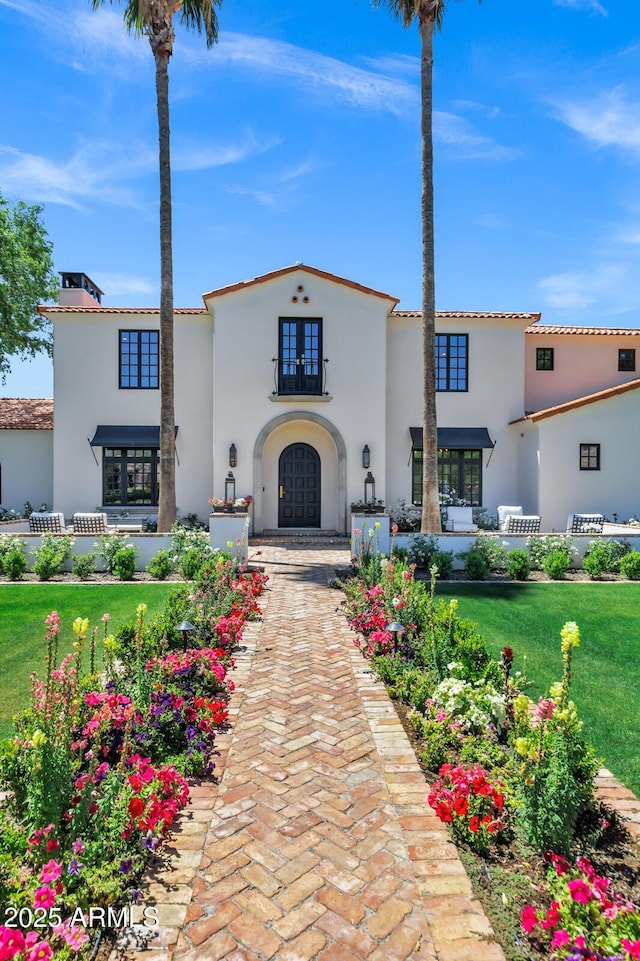 2339 E Virgo Pl, Chandler, AZ 85249 - view of front facade with stucco siding, a front yard, and french doors