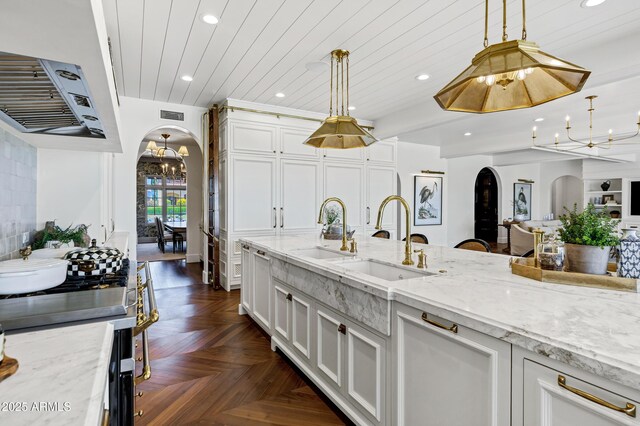 2339 E Virgo Pl, Chandler, AZ 85249 - kitchen featuring arched walkways, a chandelier, recessed lighting, a sink, and wood ceiling
