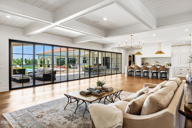 2339 E Virgo Pl, Chandler, AZ 85249 - living area with arched walkways, beamed ceiling, baseboards, and recessed lighting
