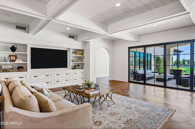 2339 E Virgo Pl, Chandler, AZ 85249 - living room with baseboards, recessed lighting, arched walkways, beamed ceiling, and built in features