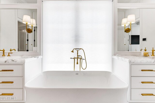 2339 E Virgo Pl, Chandler, AZ 85249 - full bathroom featuring a freestanding tub and vanity
