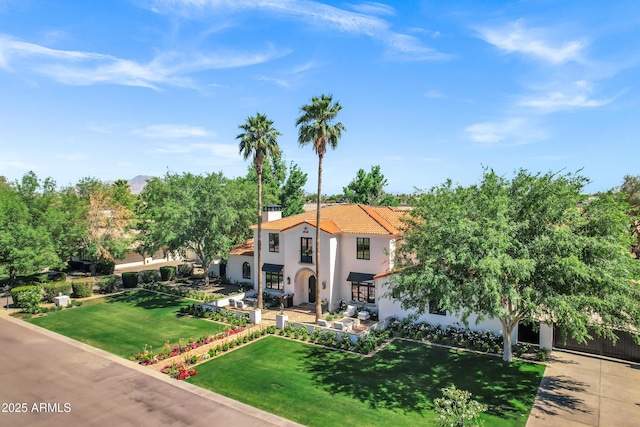 2339 E Virgo Pl, Chandler, AZ 85249 - mediterranean / spanish house with stucco siding, a tiled roof, and a front yard