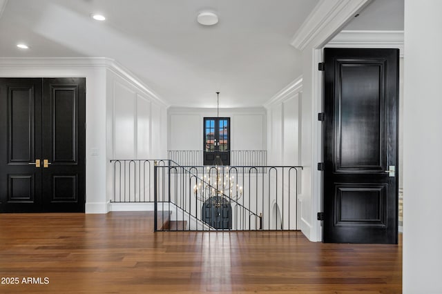 2339 E Virgo Pl, Chandler, AZ 85249 - hall with an upstairs landing, wood finished floors, ornamental molding, a chandelier, and recessed lighting