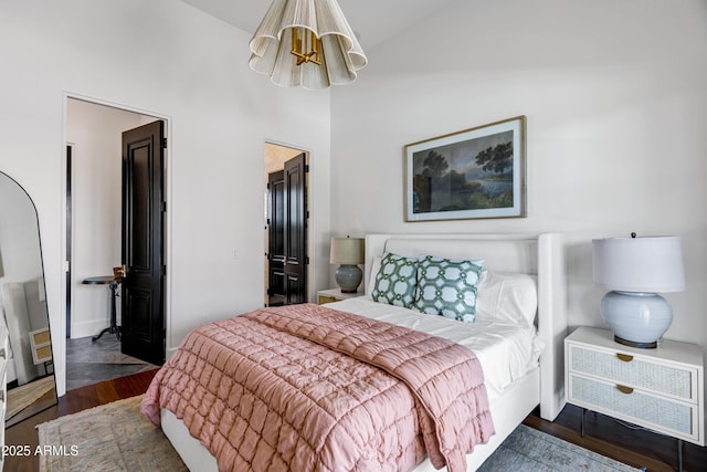 2339 E Virgo Pl, Chandler, AZ 85249 - bedroom featuring a chandelier, wood finished floors, a walk in closet, lofted ceiling, and a closet