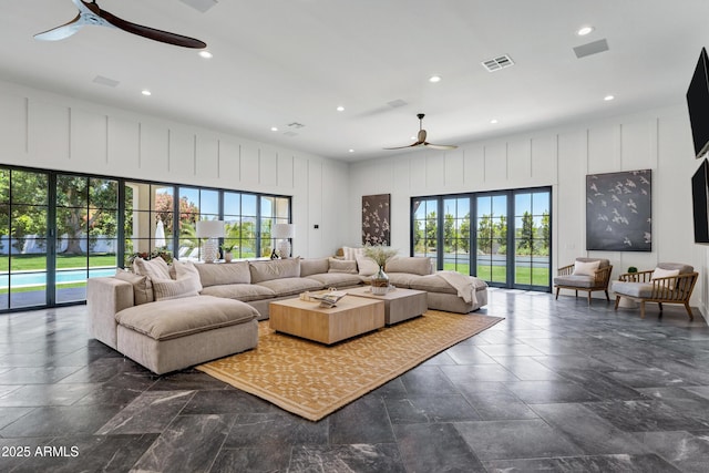 2339 E Virgo Pl, Chandler, AZ 85249 - living room featuring a ceiling fan, healthy amount of natural light, a decorative wall, and recessed lighting