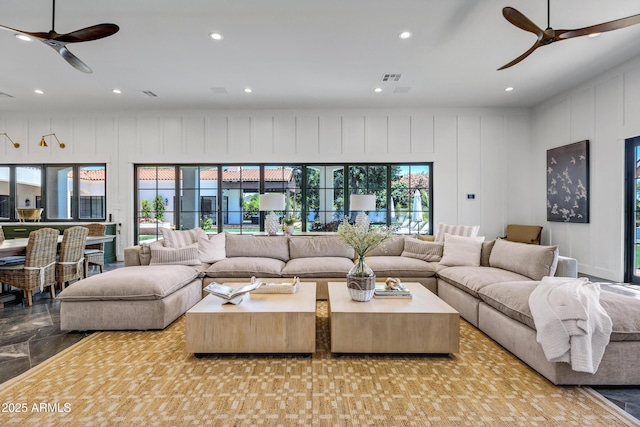 2339 E Virgo Pl, Chandler, AZ 85249 - living area with a ceiling fan, a decorative wall, and recessed lighting
