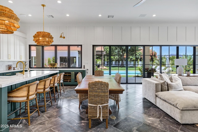 2339 E Virgo Pl, Chandler, AZ 85249 - dining space featuring recessed lighting and beverage cooler